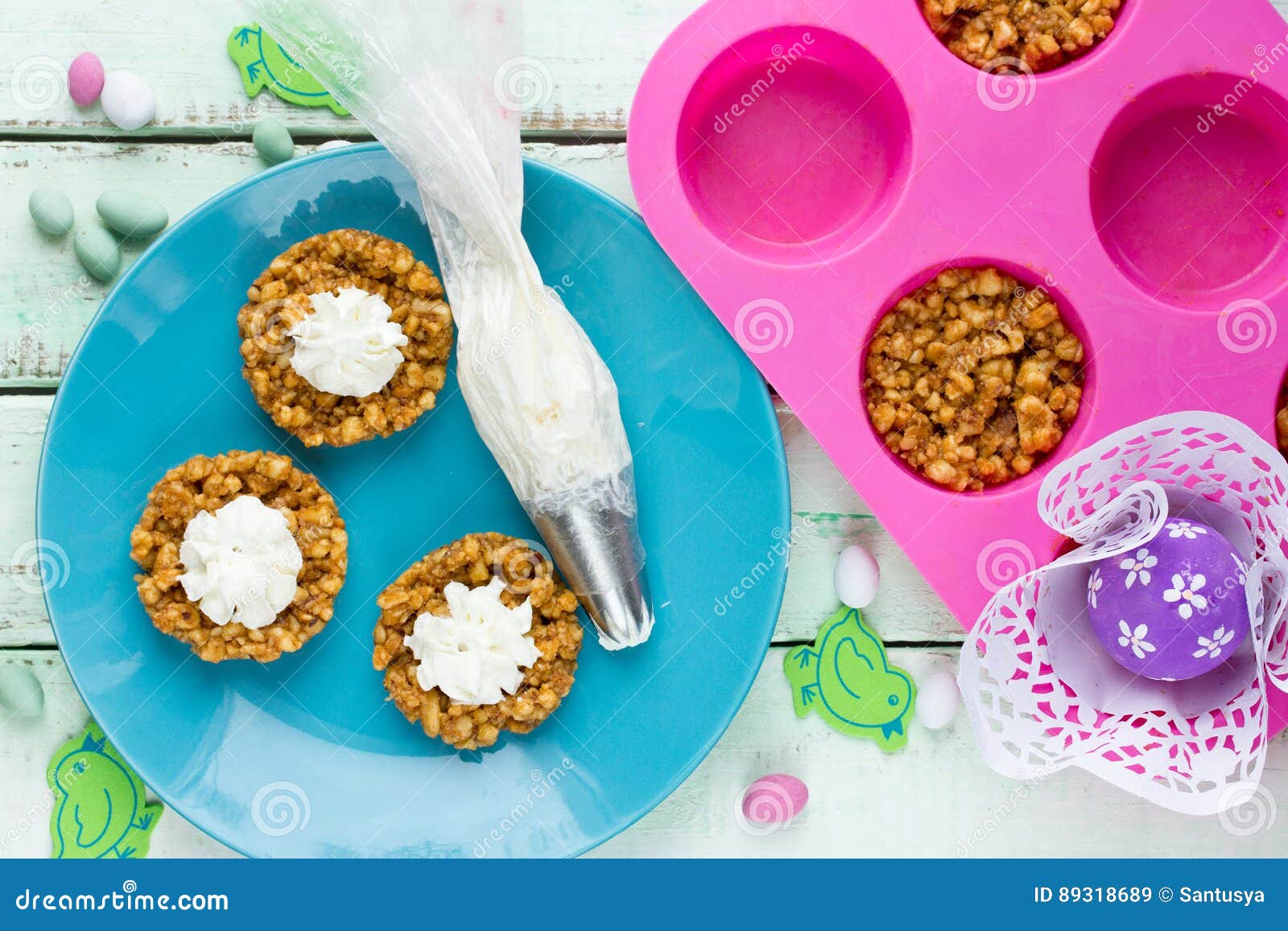 Easter Cookie Nests with Whipped Cream and Mini Egg Candy Stock Image