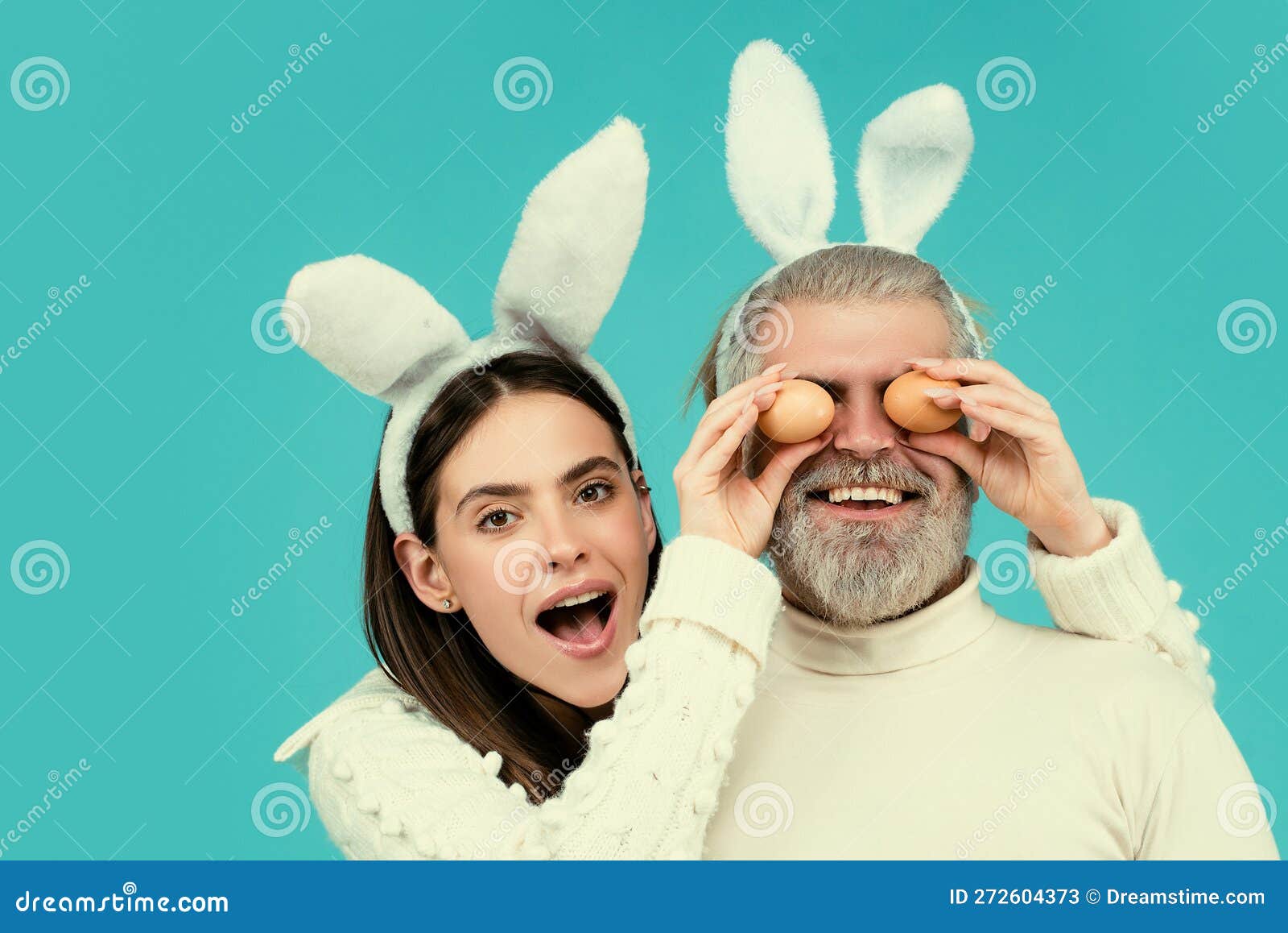 Easter Couple. Happy Smiling Couple with Easter Eggs. Stock Image