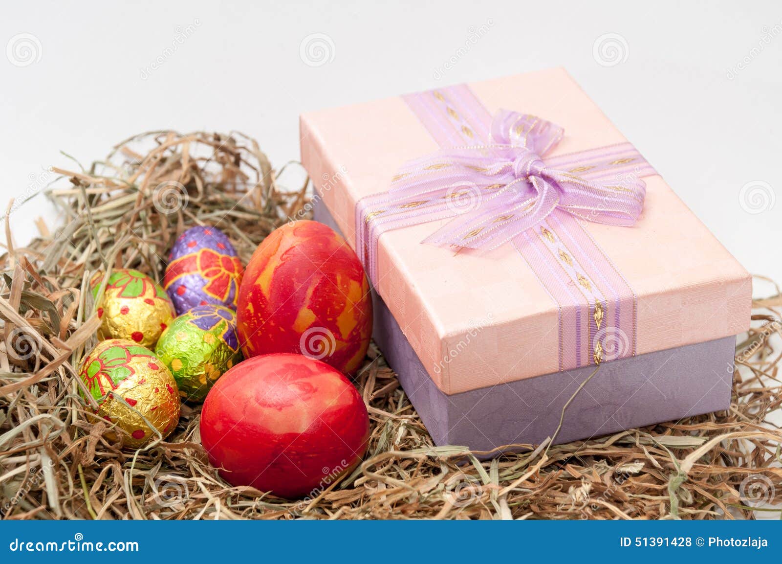 Easter Decorative Chocolate and Chicken Eggs in the Nest with Pi Stock