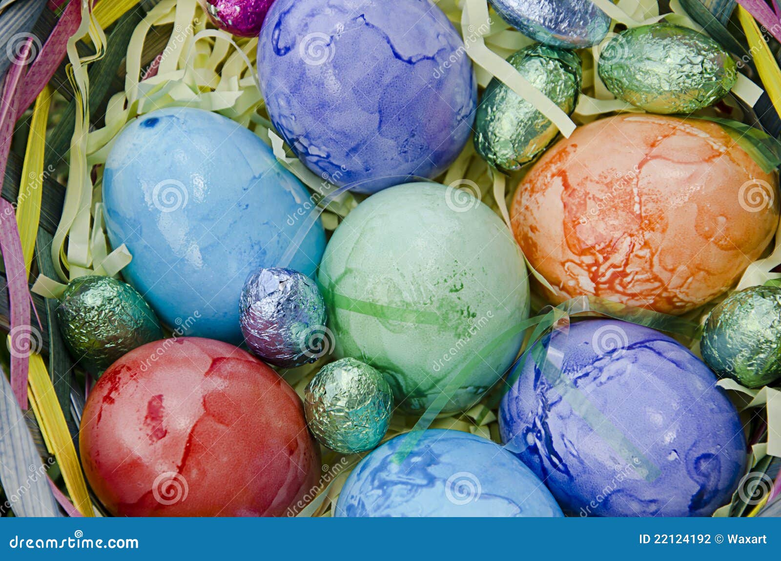 Easter eggs in a basket stock photo. Image of easter 22124192