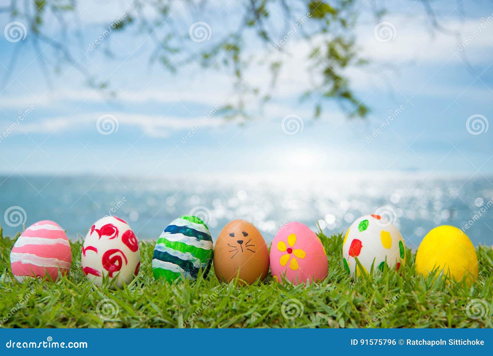 Easter Eggs Grass on the Beach, the Sea, Beautiful Stock Photo Image