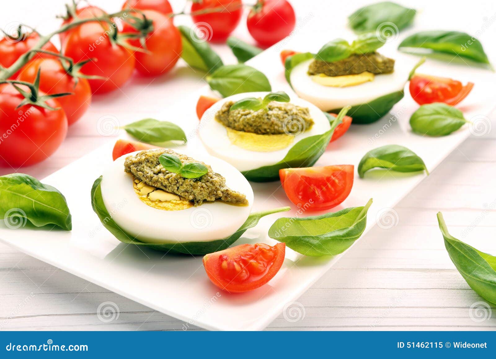 Easter Eggs with Pesto and Cherry Tomatoes Stock Image Image of