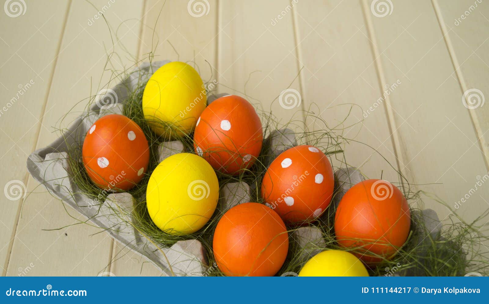 Easter. Easter Eggs are Yellow and Orange. Eggs Lie in the Container ...