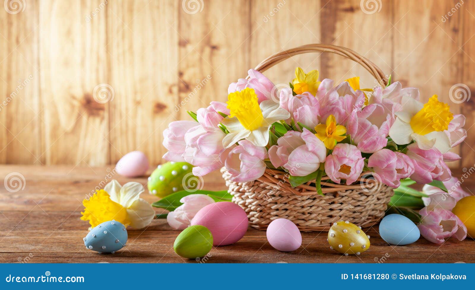 Easter Holiday Basket with Beautiful Spring Flowers and Easter Eggs ...