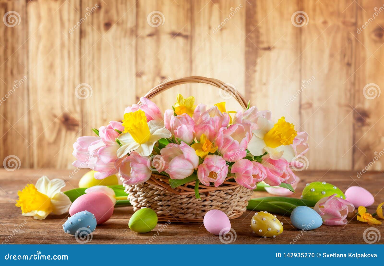 Easter Holiday Basket with Beautiful Spring Flowers and Easter Eggs ...