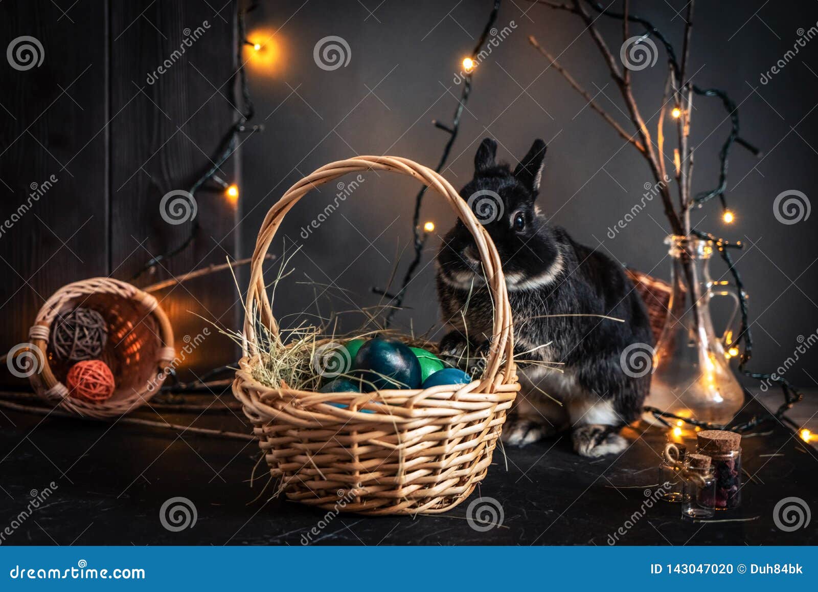 Easter Holiday a Little Black Easter Bunny and a Wicker Basket with