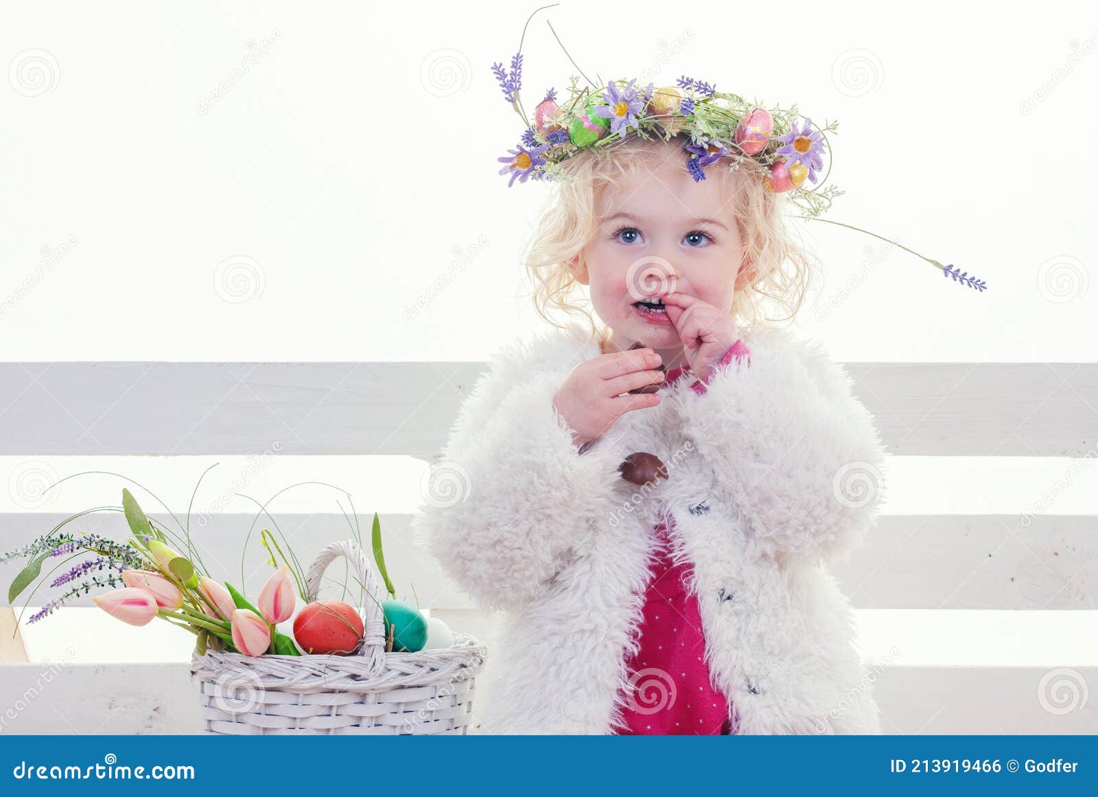 Easter hunt girl eggs and flower basket