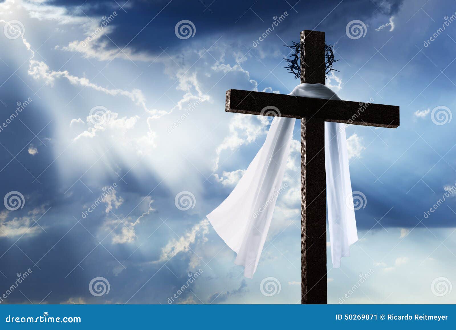 easter morning sunrise with cross, burial cloth, crown of thorns and blue sky