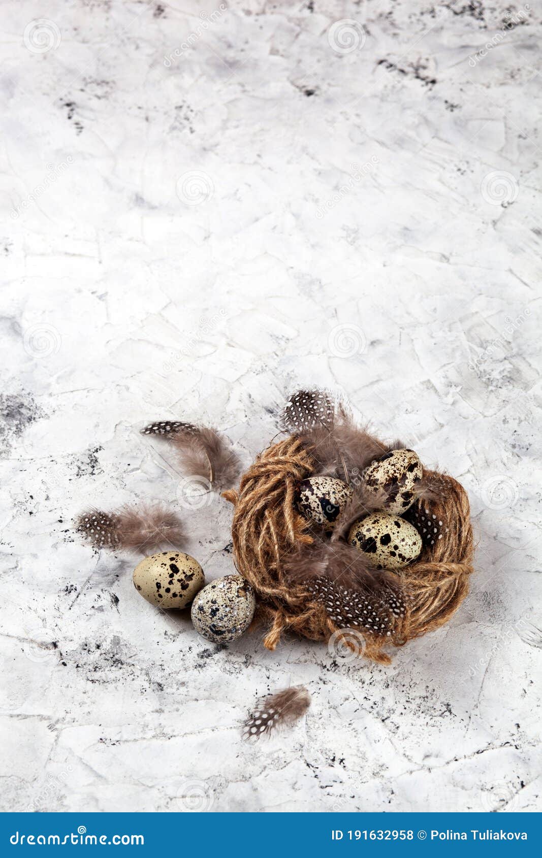 easter quail eggs in nest on bright background