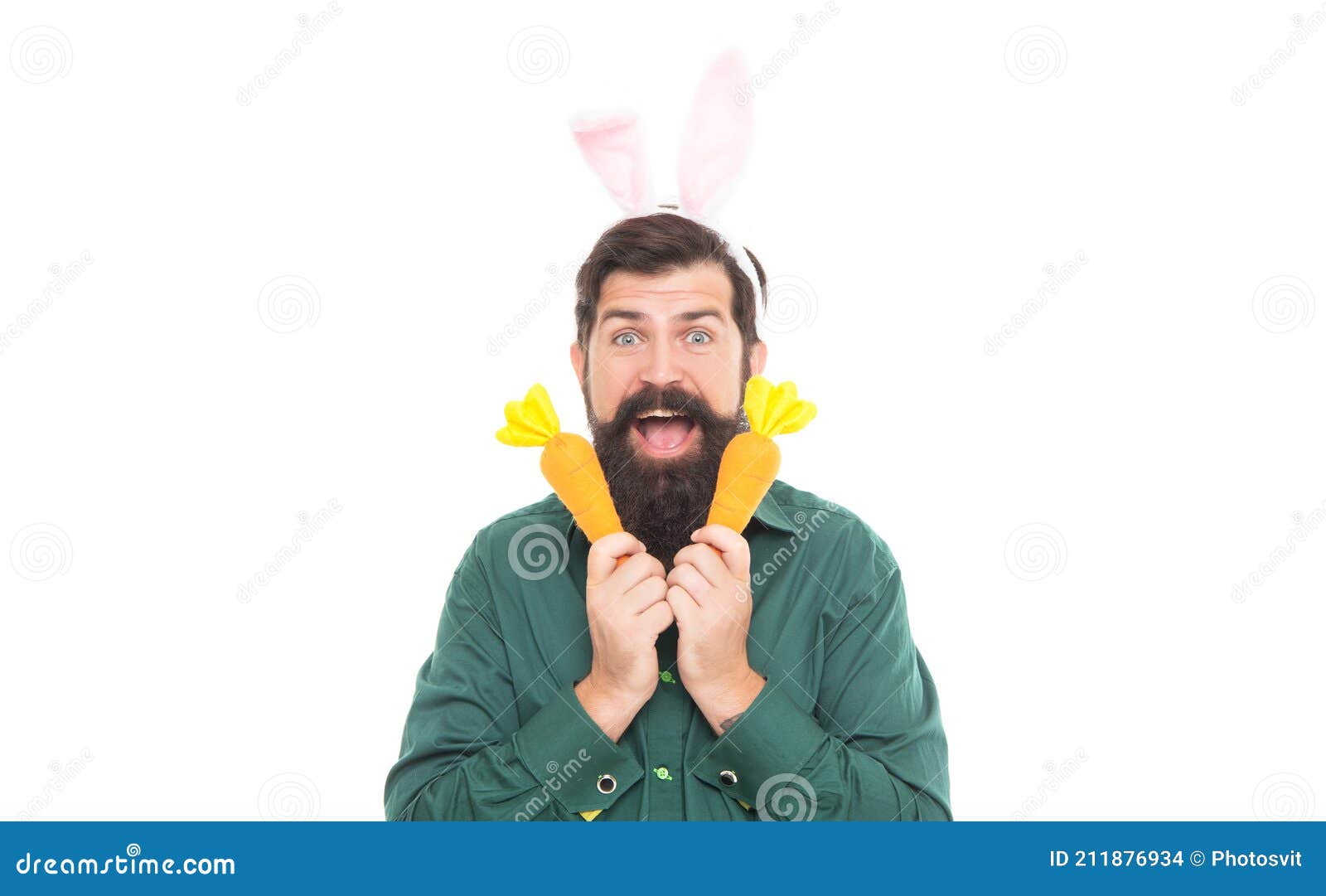 easter surprises. cheerful guy holding carrots. spring holiday greeting. eastertide. surprised man