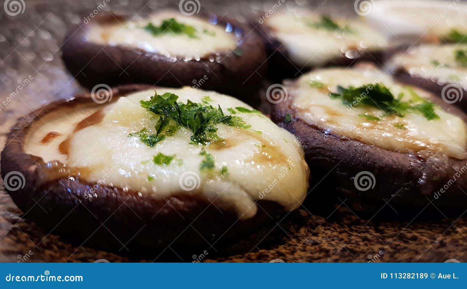 an easy healthy snack recipe, cheese-stuffed shiitake mushrooms.