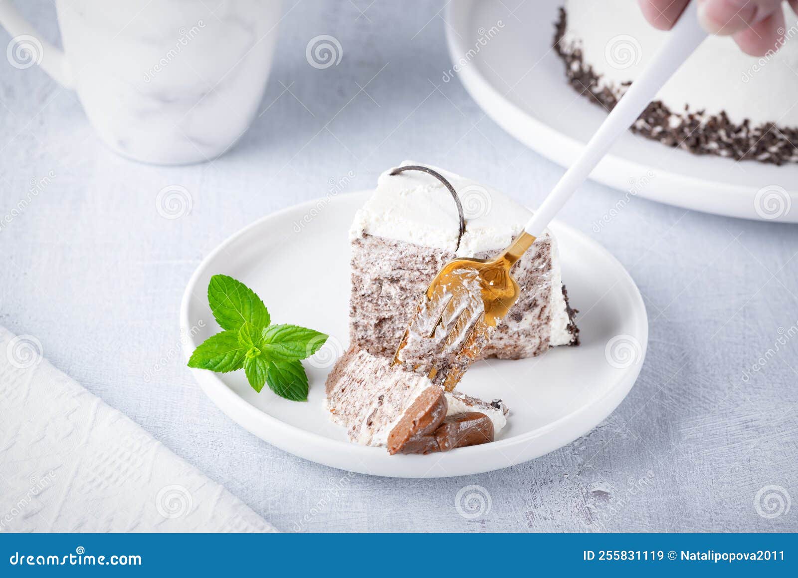 Eating Chocolate Cheesecake. Taking Bite of Cheesecake with Fork Stock