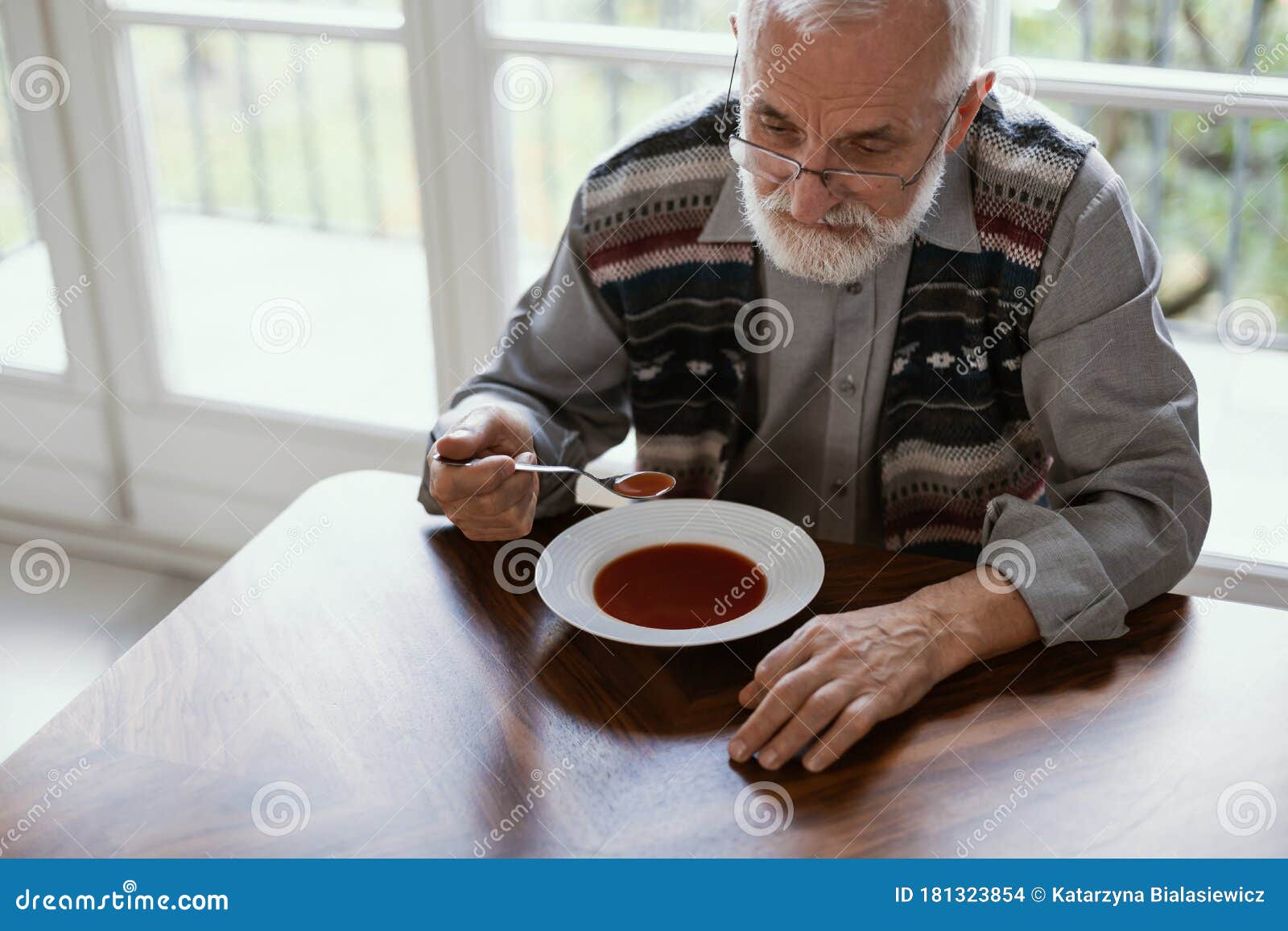 Eating dinner alone stock photo. Image of wrinkled, parkinson 181323854