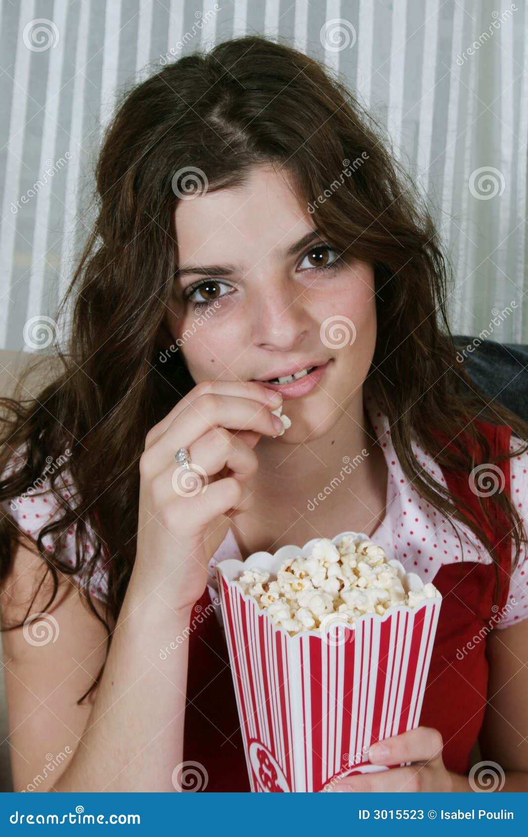 Eating popcorn stock image. Image of girl, eating, enjoyment 3015523