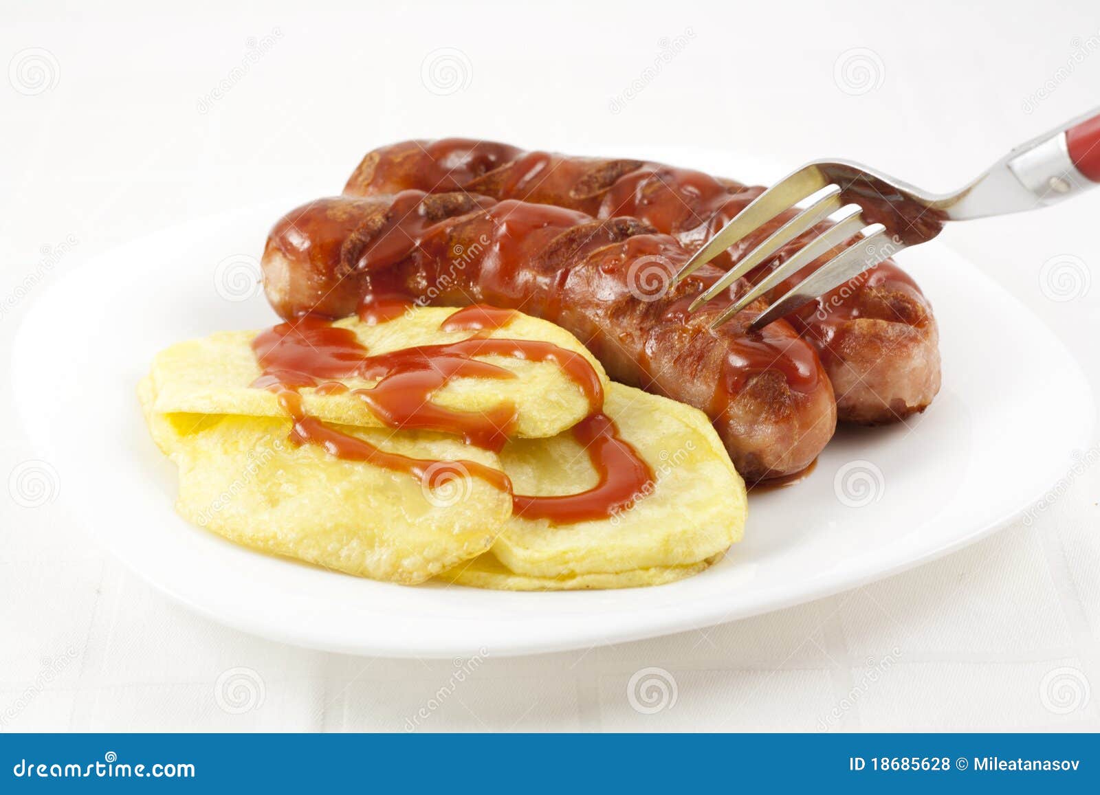 Eating sausages stock photo. Image of meat, fork, sauce 18685628