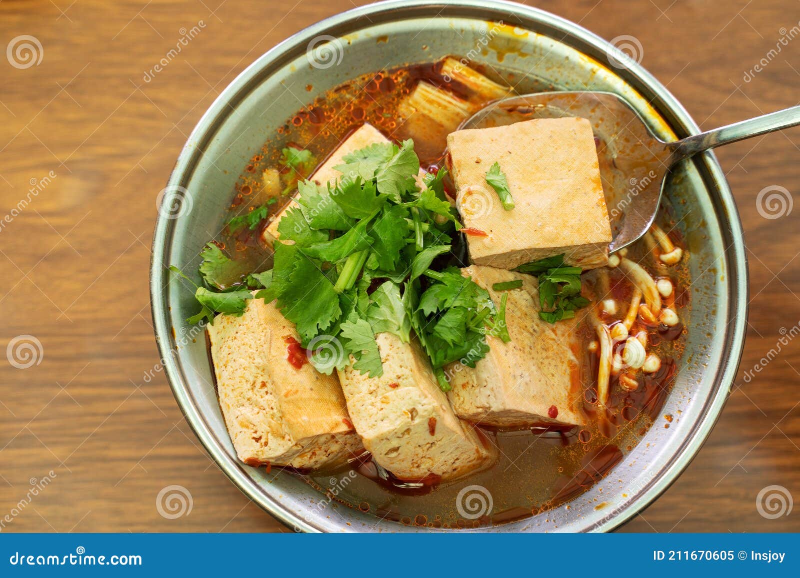 eating stinky tofu hot pot with spicy soup