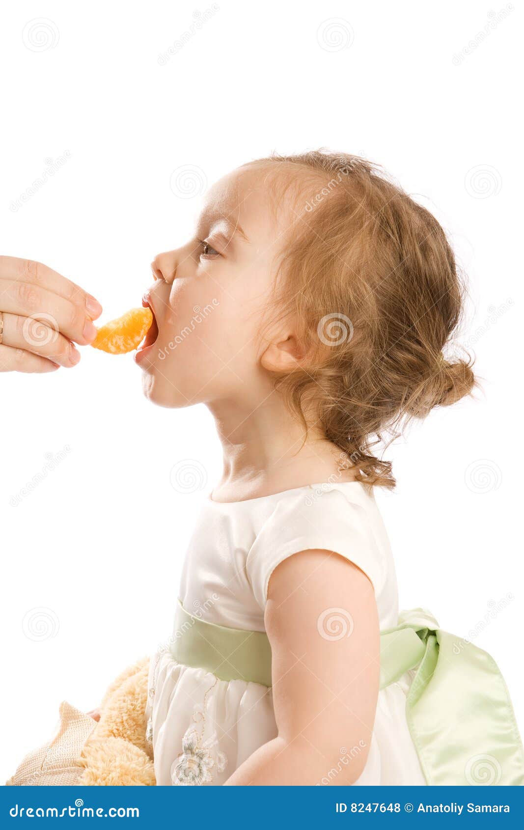 Eating tangerine stock photo. Image of girl, person, mother 8247648