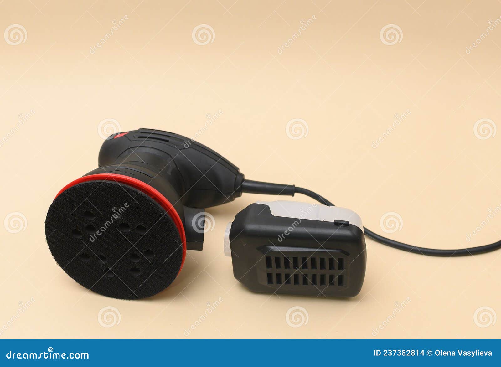 Eccentric Orbital Grinder and a Chip Collection Container. Stock Photo