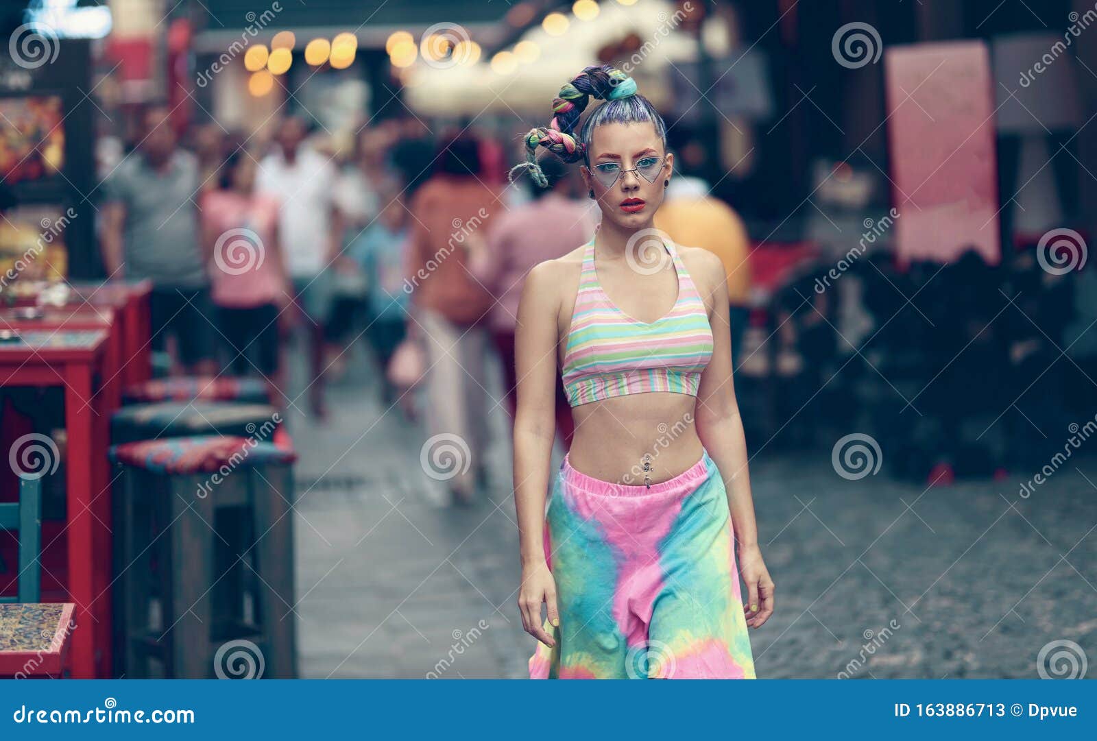 eccentric woman model walking down the street - female nonconformist - unconventional girl