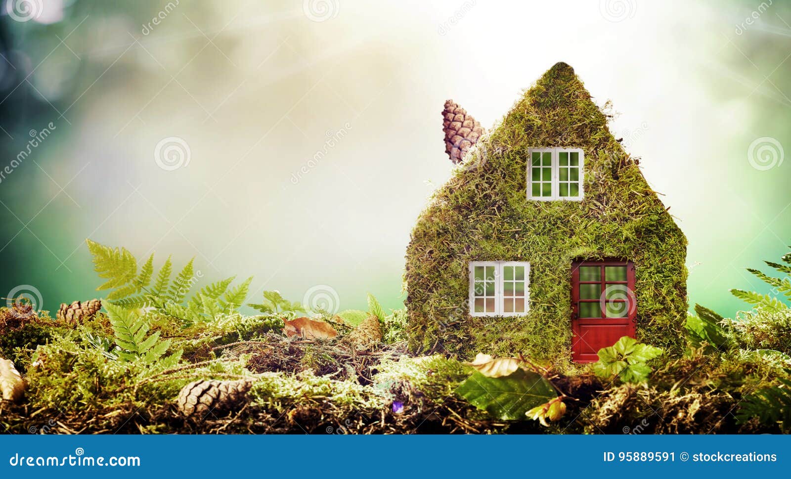 eco friendly house concept with moss covered model