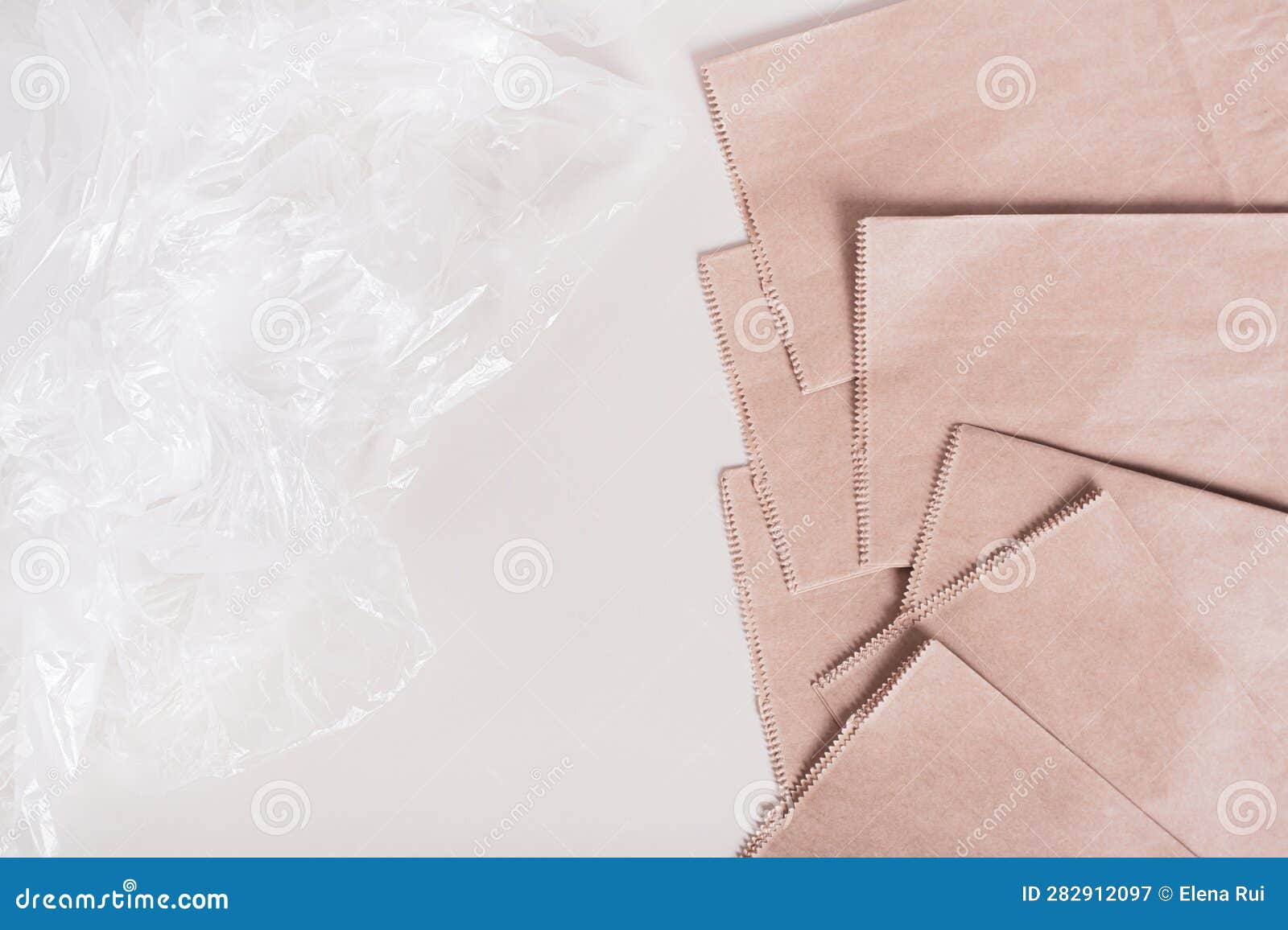 Ecofriendly Paper Bags and Crumpled Cellophane Plastic Bags on the