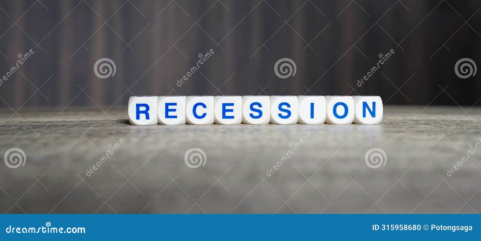 recession boggle word cubes on dark background