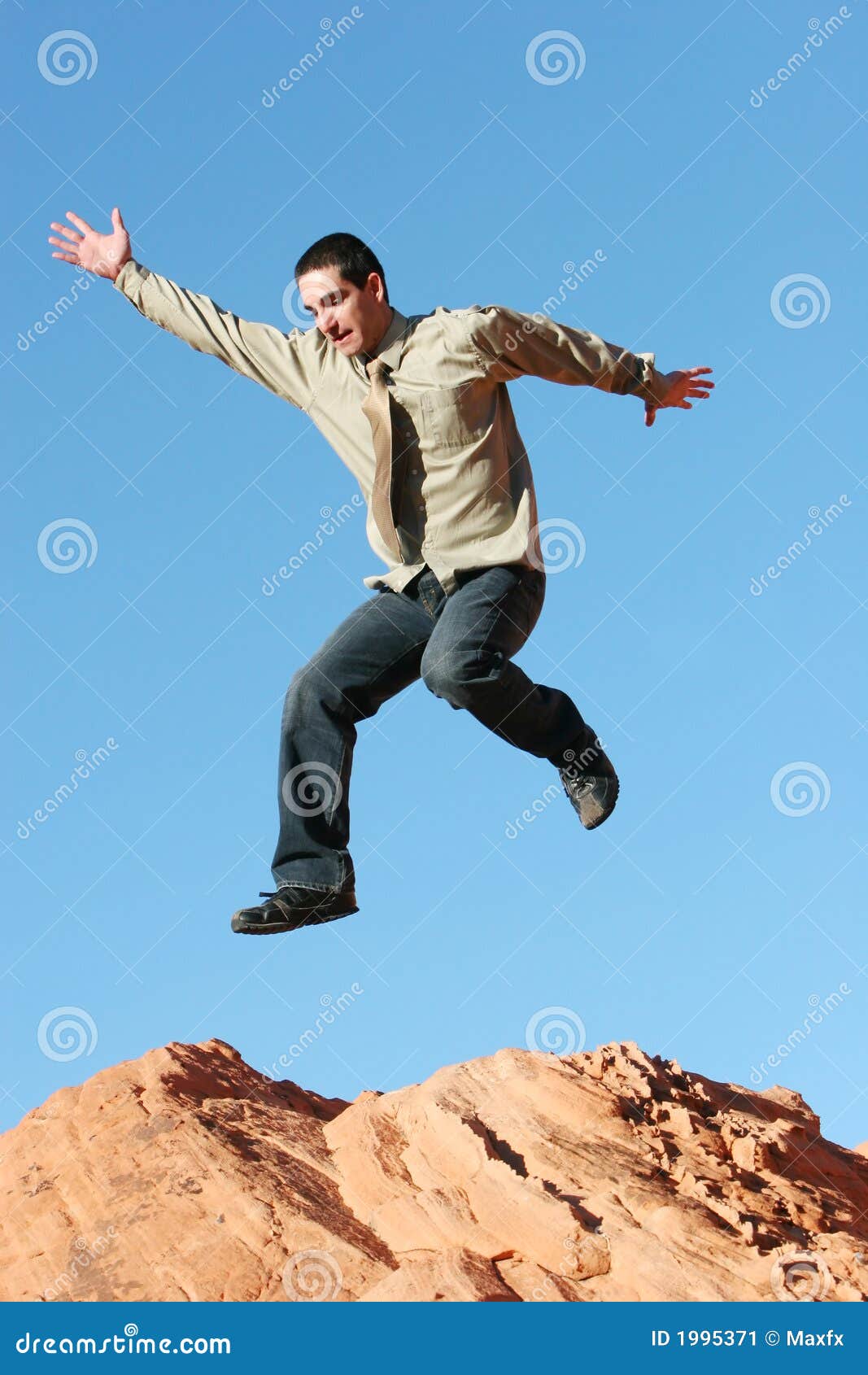 ecstatic business man jumping