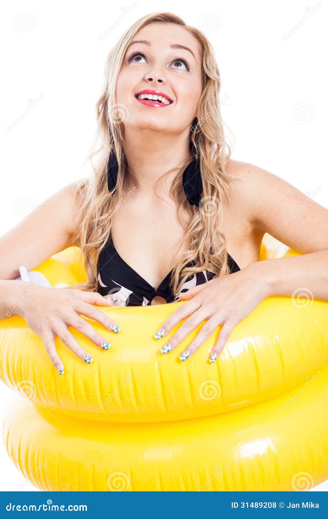 ecstatic girl in swimsuit and rubber ring