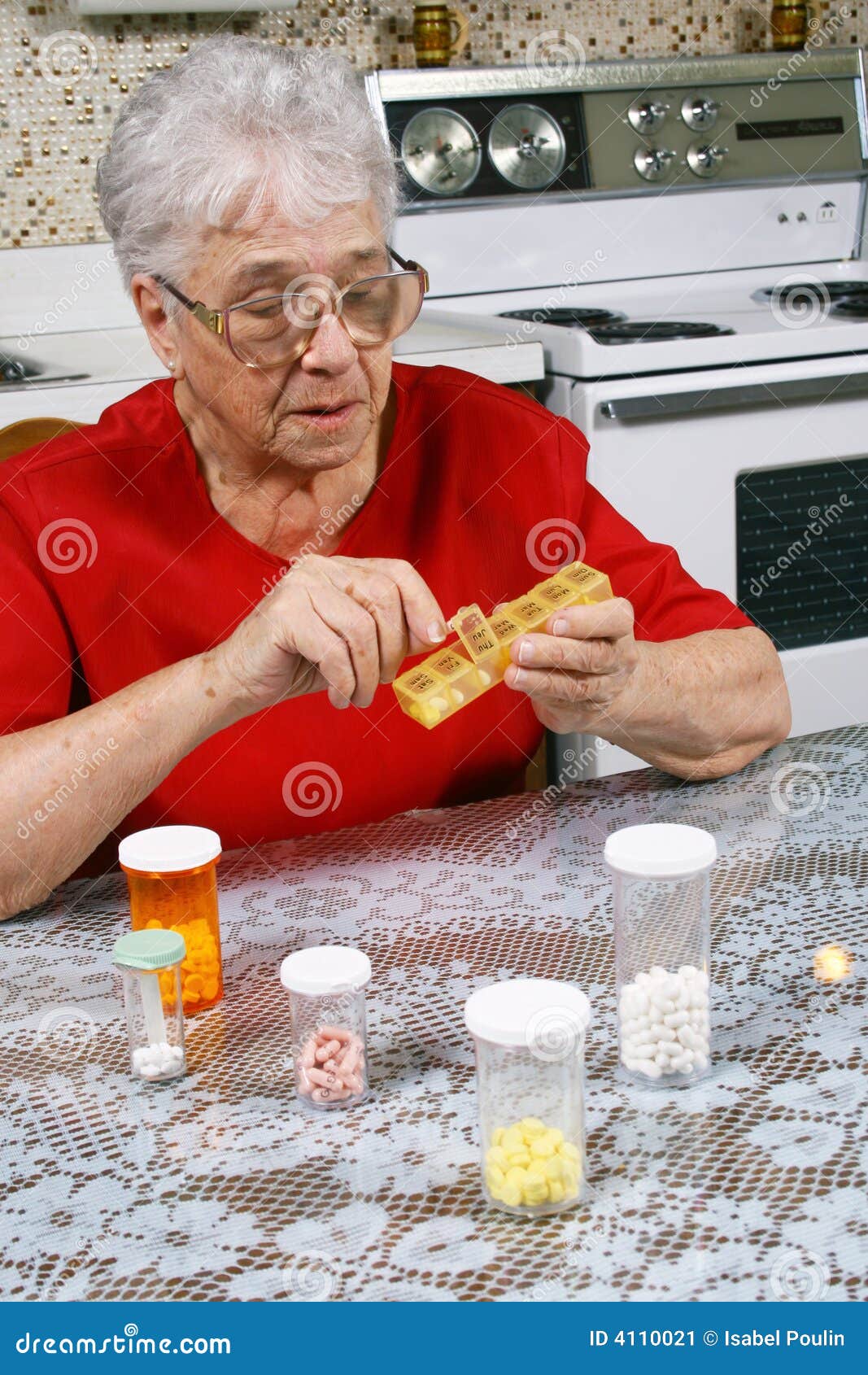 ederly woman taking pills