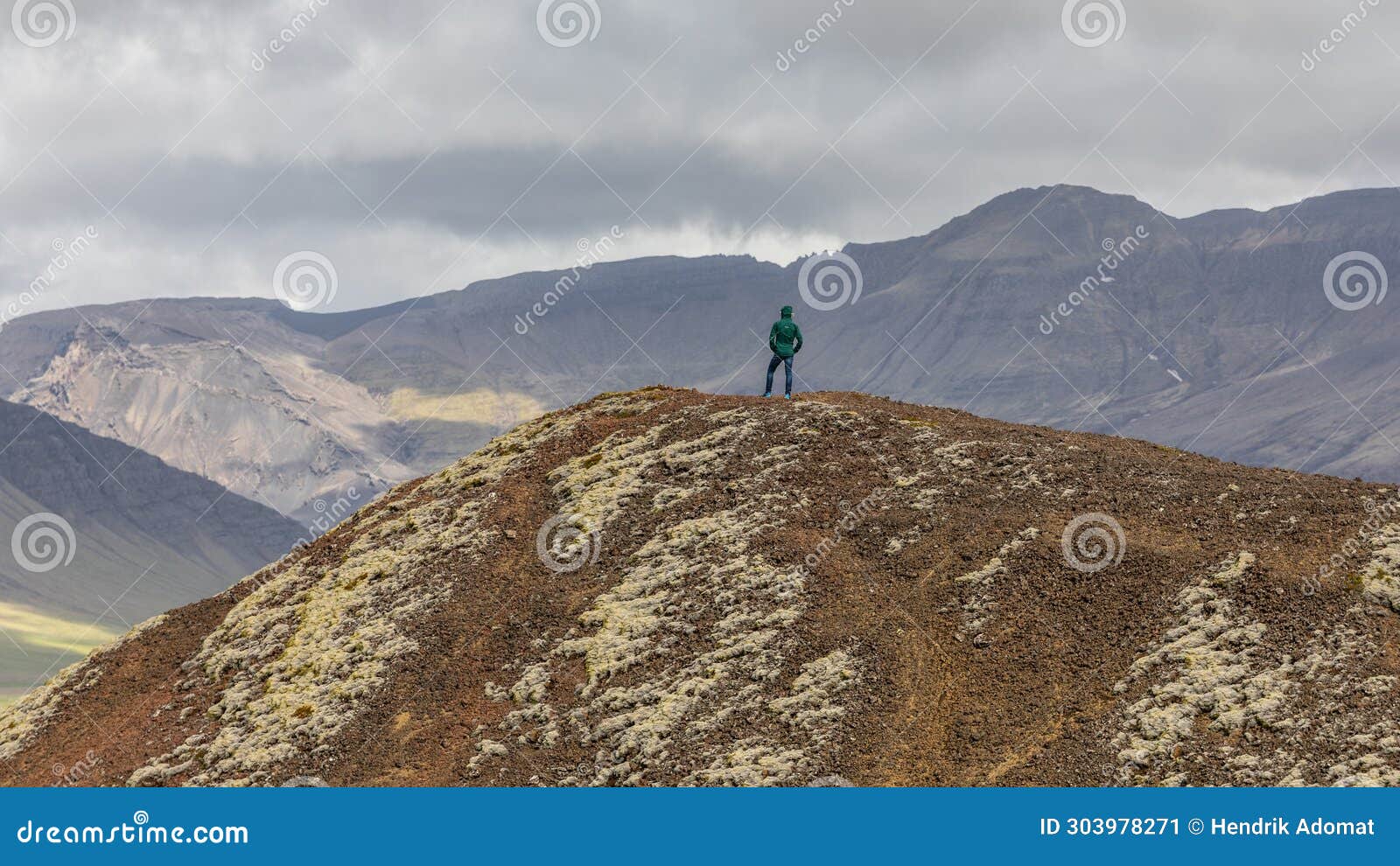 on the edge of the eldborg crater in iceland.