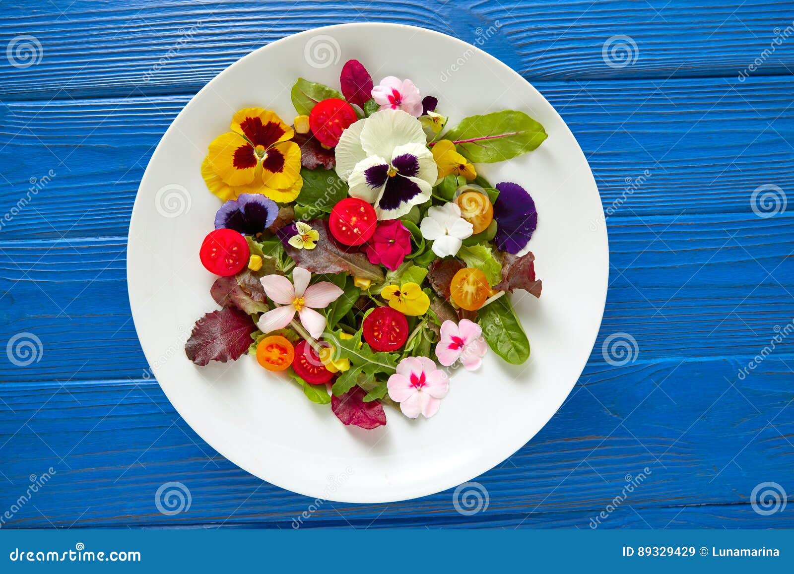 edible flowers salad in a plate