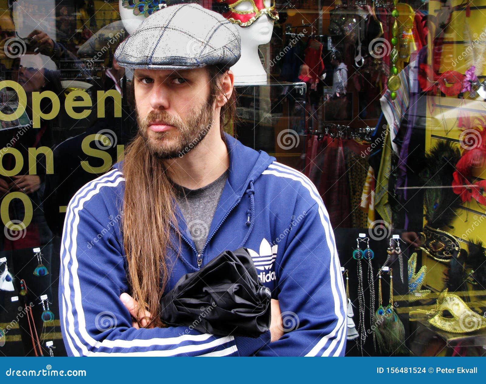 A Man with Long Hair and Traditional Cap Editorial Stock Image - Image of  human, long: 156481524