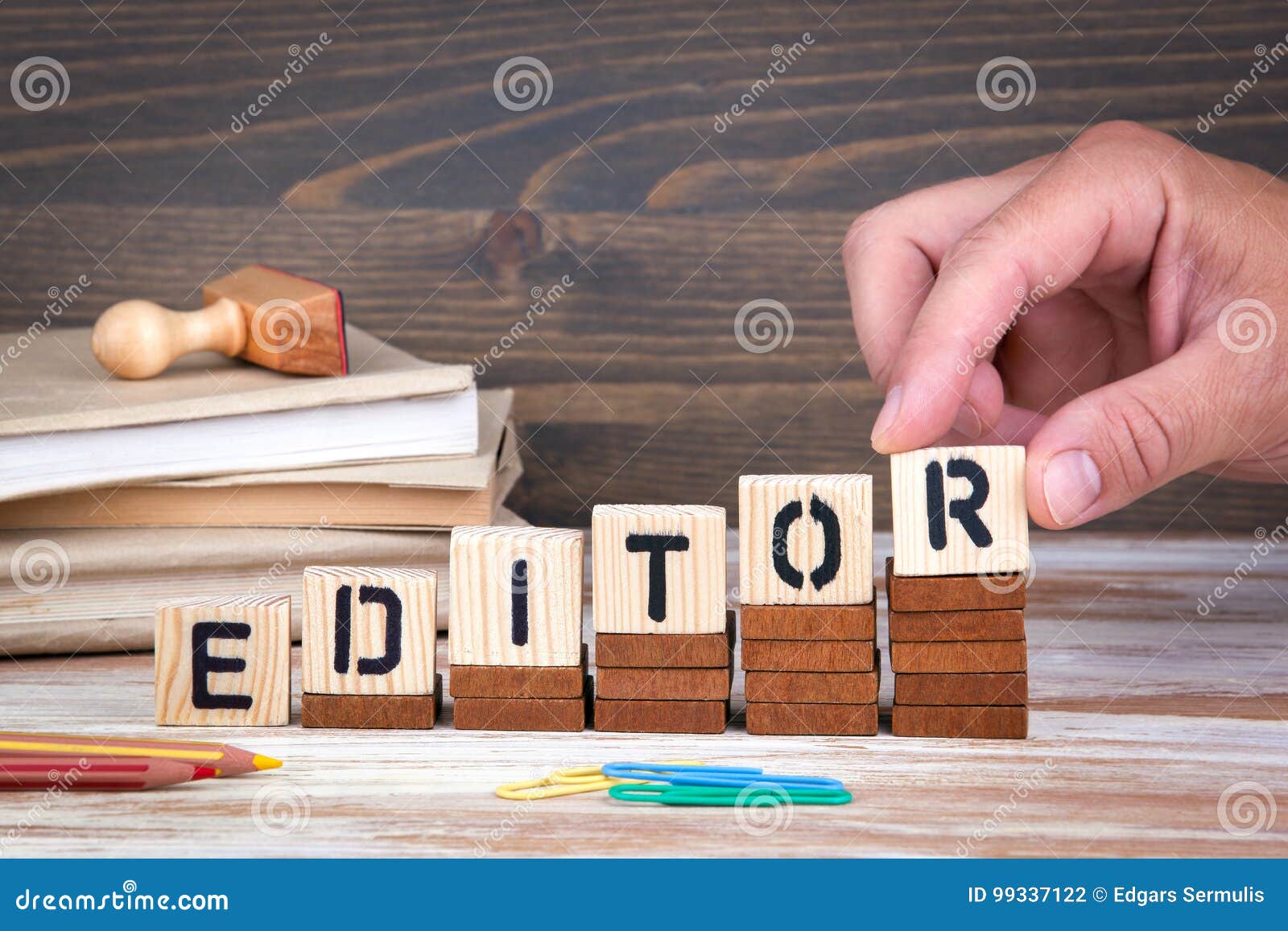 editor concept. wooden letters on the office desk, informative and communication background