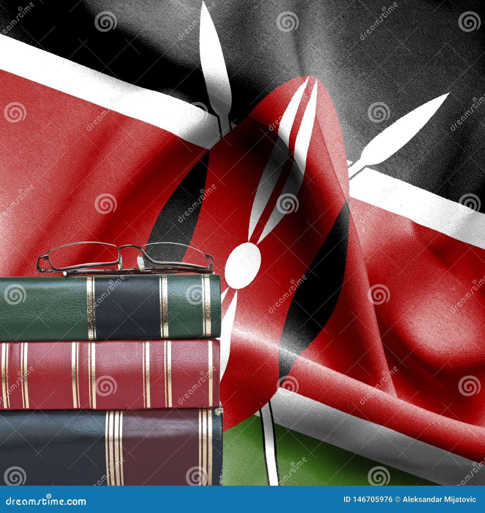 Education Concept Stack of Books and Reading Glasses Against National Flag of Kenya Stock
