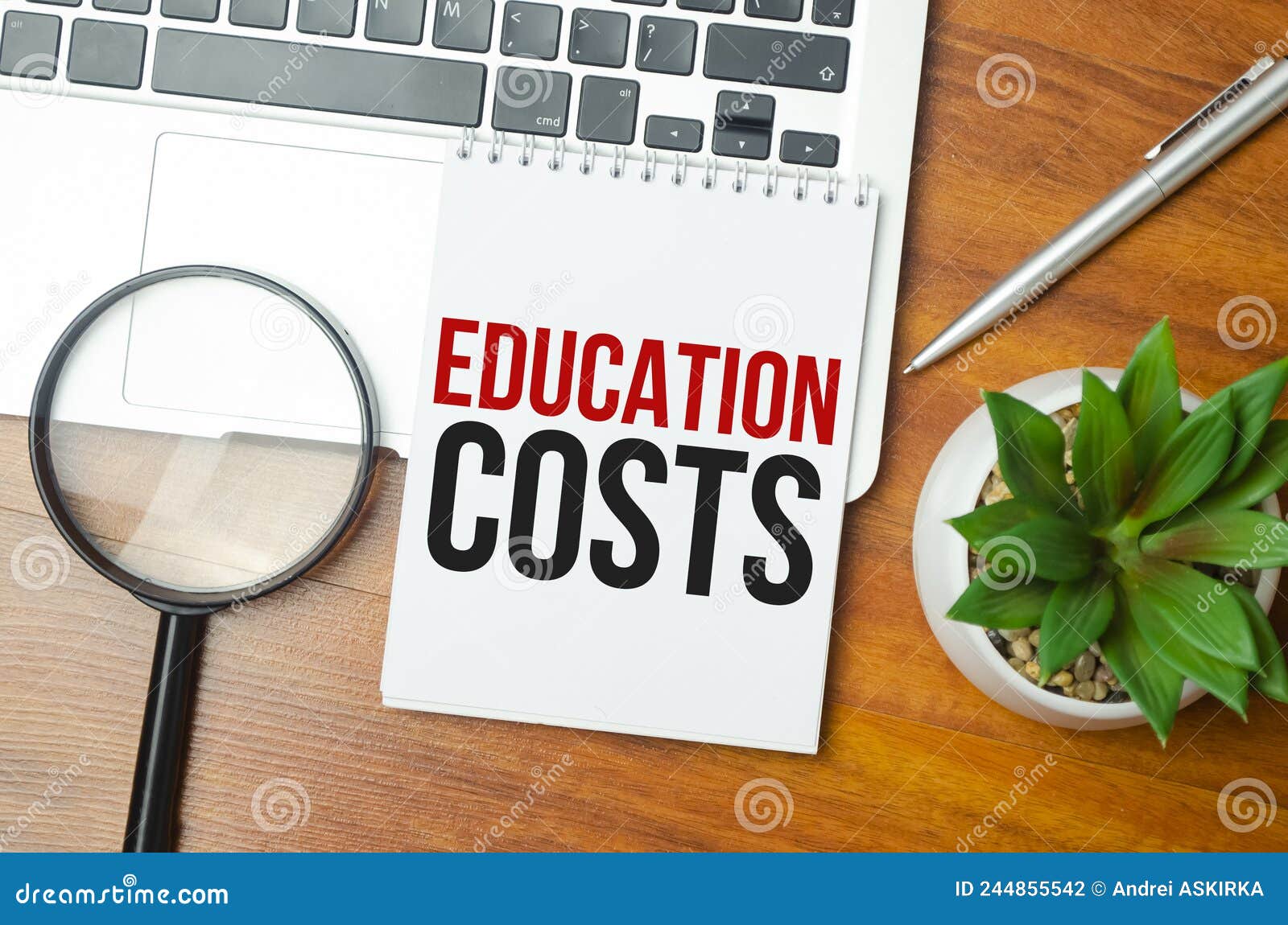 EDUCATION COSTS Text on Blue Sticker on Chart with Calculator and
