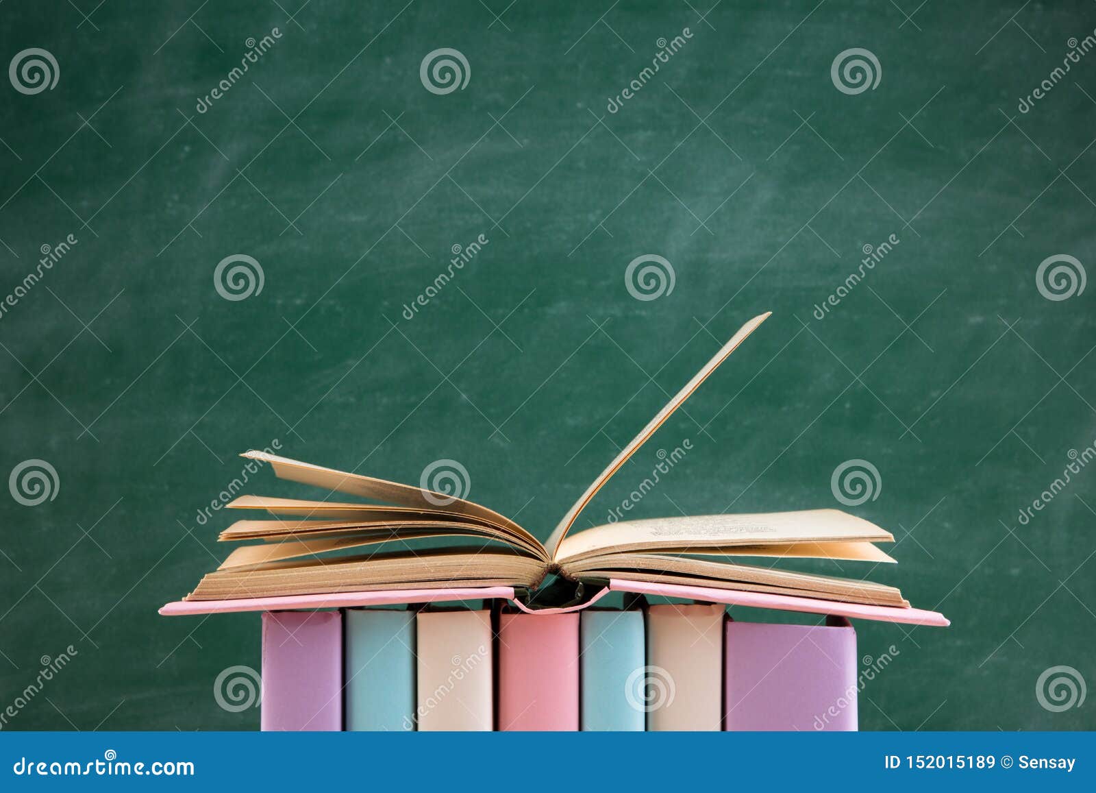 Education and Reading Concept - Group of Colorful Books on the Wooden Table  in the Classroom, Blackboard Background Stock Image - Image of university,  chalk: 152015189