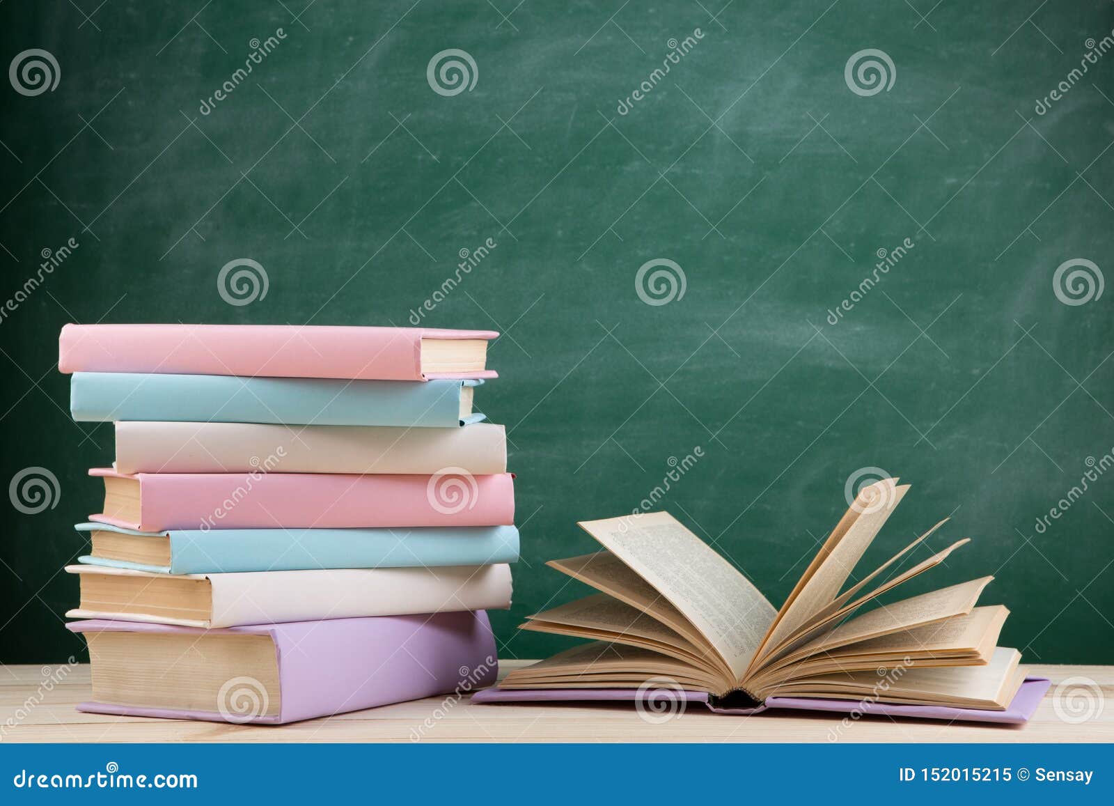 Education and Reading Concept - Group of Colorful Books on the Wooden Table  in the Classroom, Blackboard Background Stock Image - Image of classroom,  vintage: 152015215