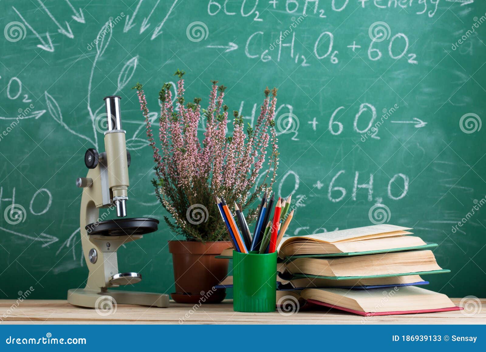 Education and Sciences Concept Book and Microscope on the Desk in the