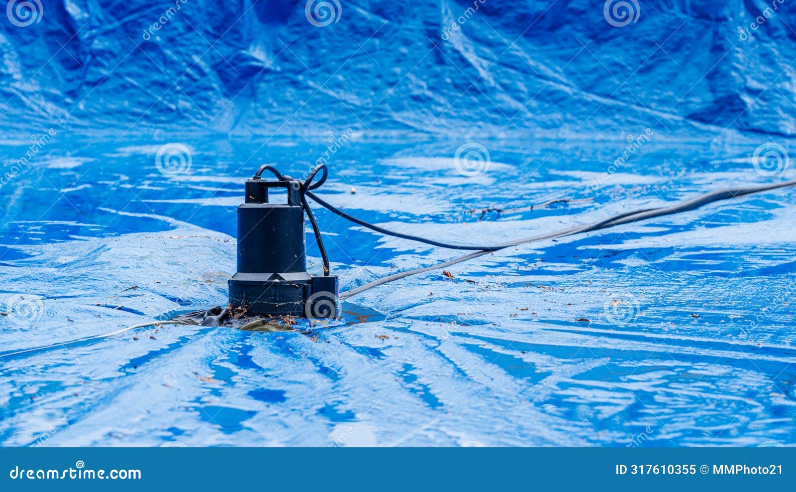 Effective Pool Winterizing with Water Pump on Pool Cover Stock Image Image of homeowner, pool