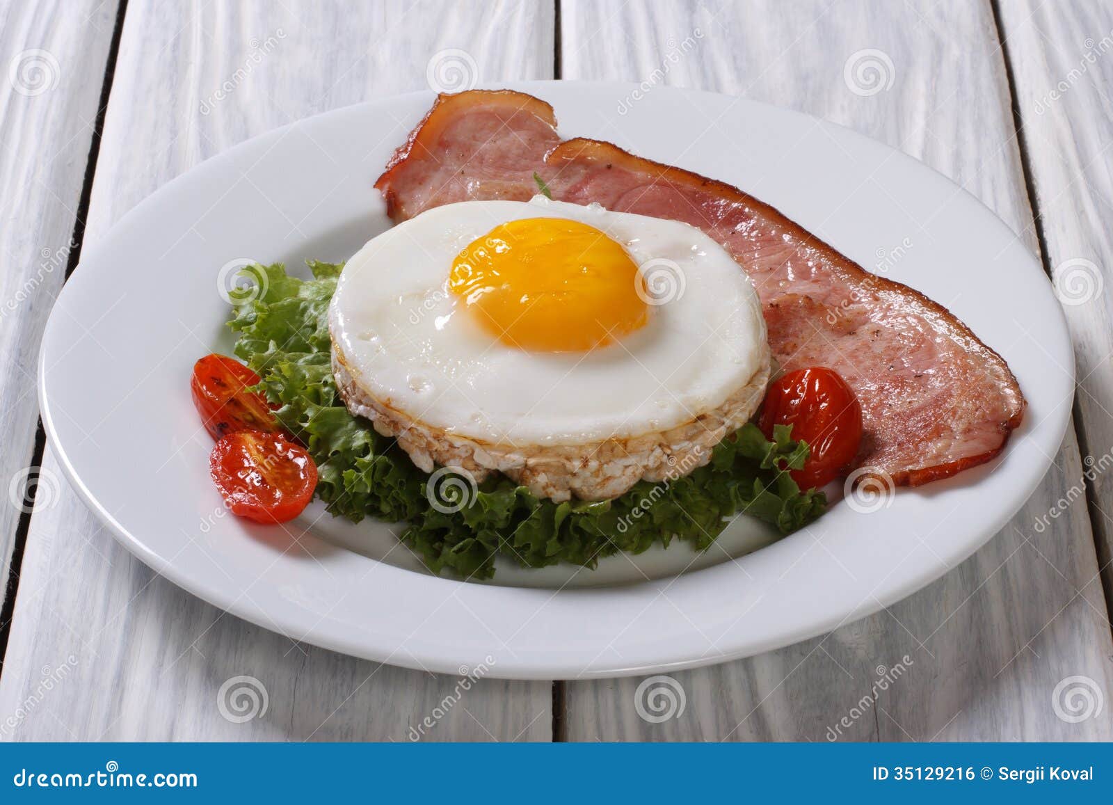 Egg with Bacon and Rice Cakes Stock Photo Image of background