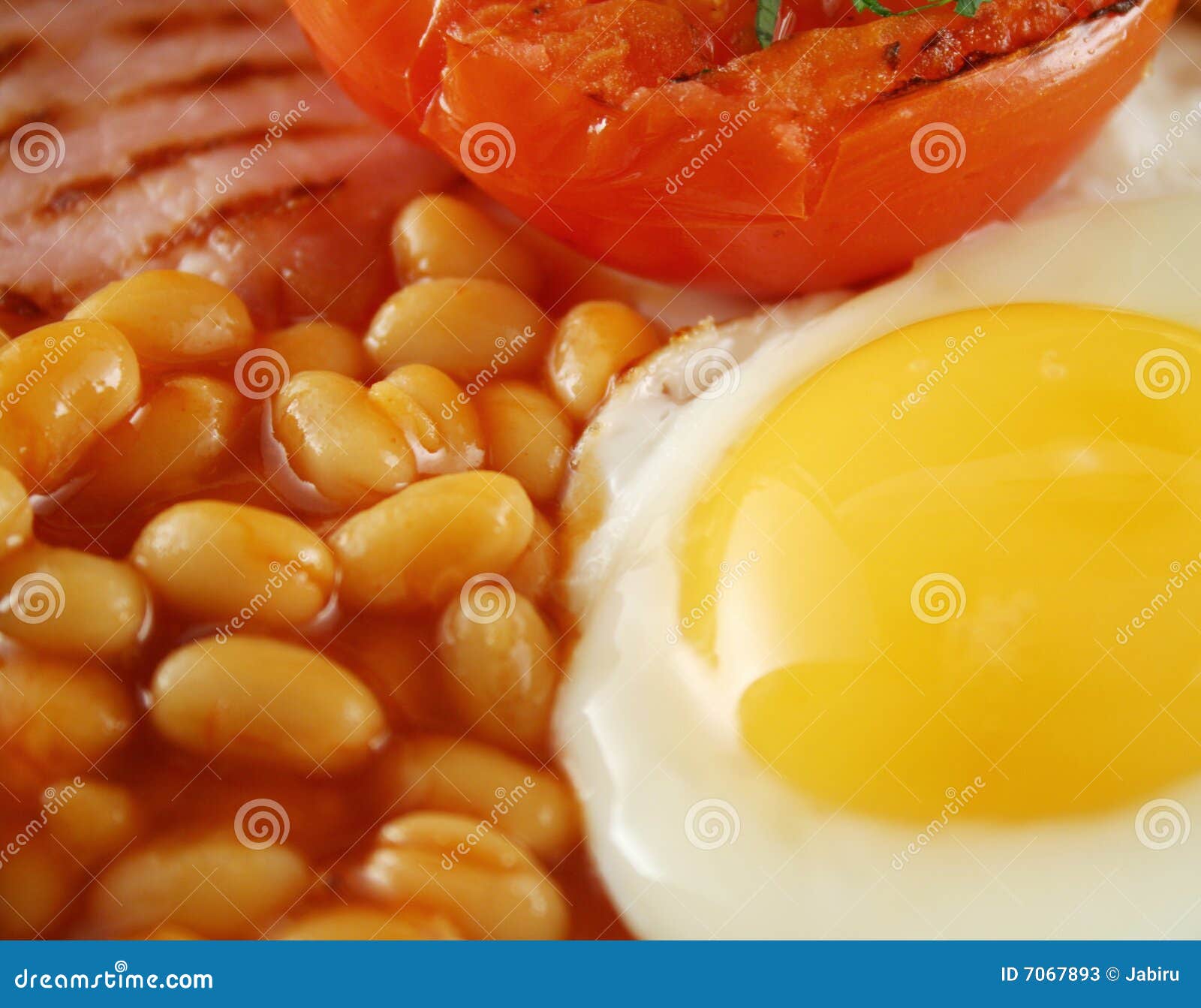 Egg and Baked Beans stock image. Image of herbs, tomato 7067893