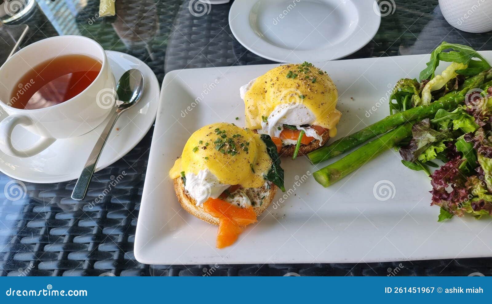 Egg benedict breakfast tea stock image. Image of meal 261451967