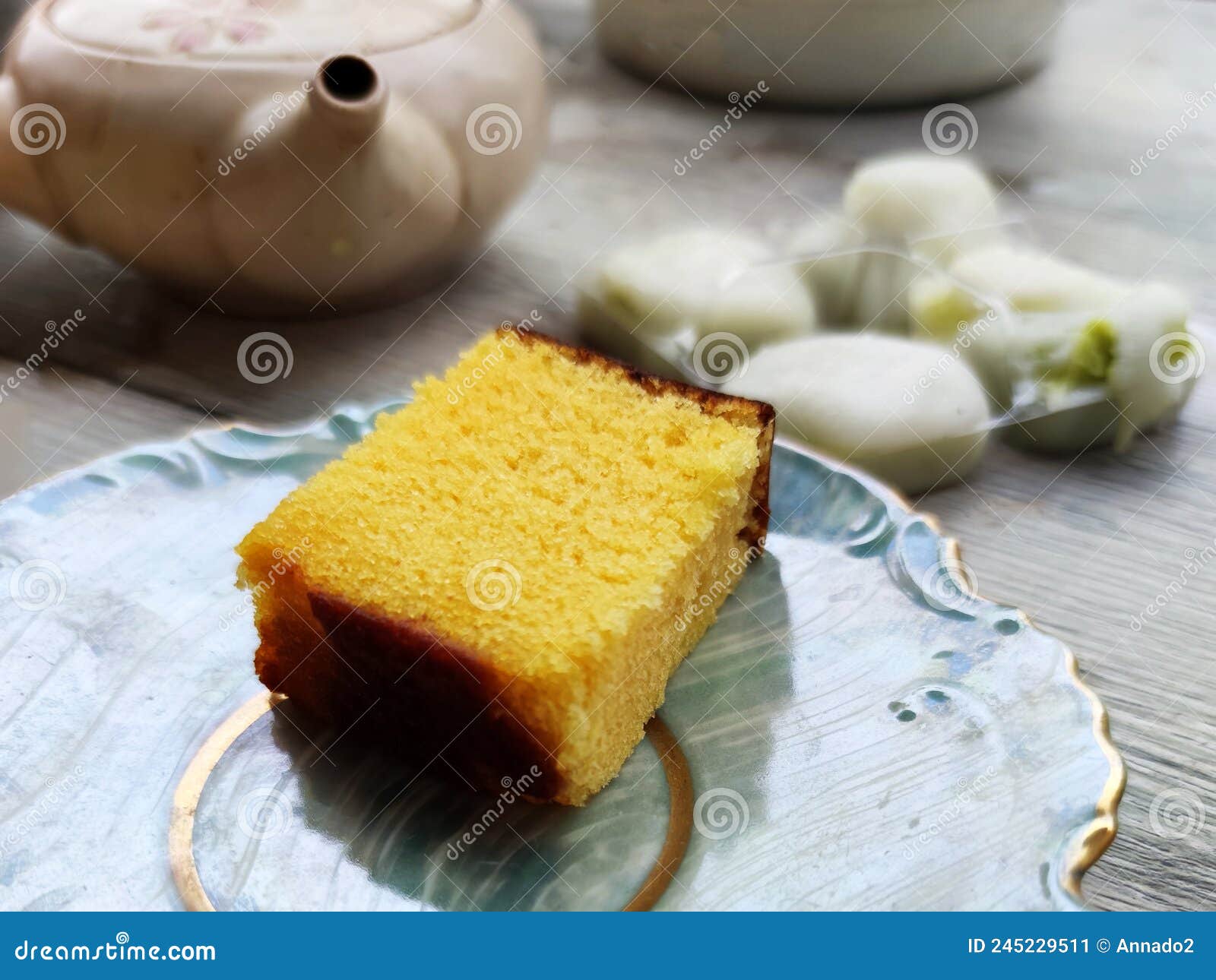 Egg Biscuit, Japanese Mochi Dessert and Teapot on the Table Stock Image