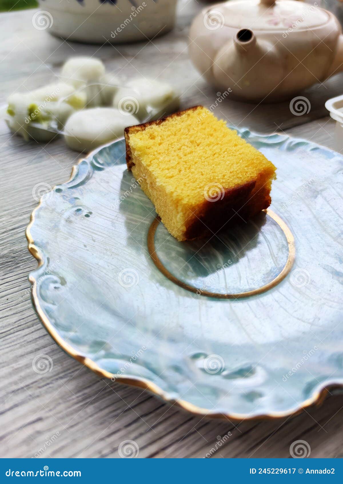 Egg Biscuit, Japanese Mochi Dessert and Teapot on the Table Stock Image