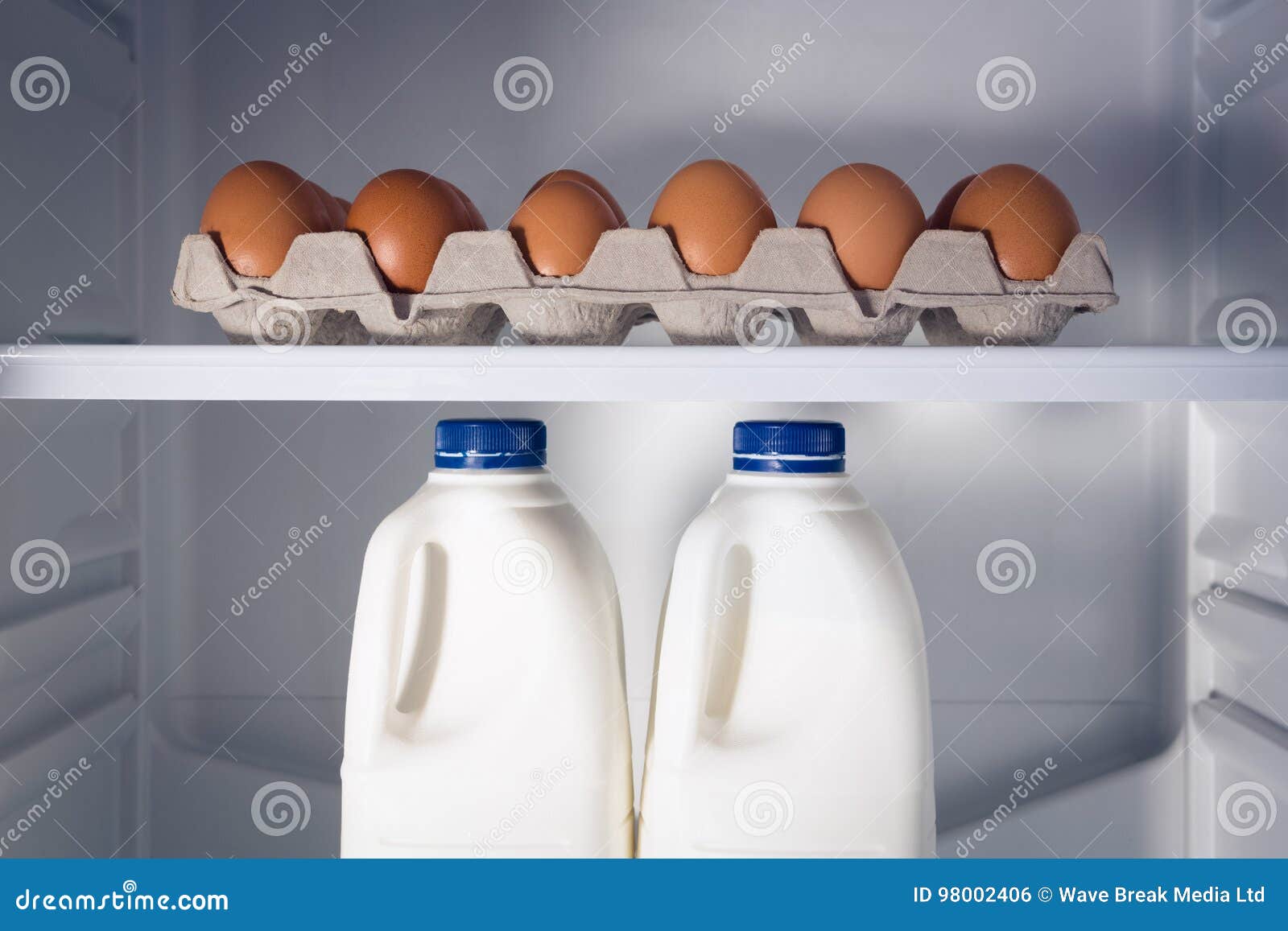Milk in refrigerator stock photo. Image of container - 11894526
