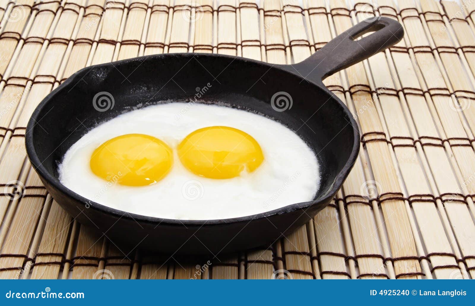 Egg on a castiron pan stock photo. Image of breakfast 4925240