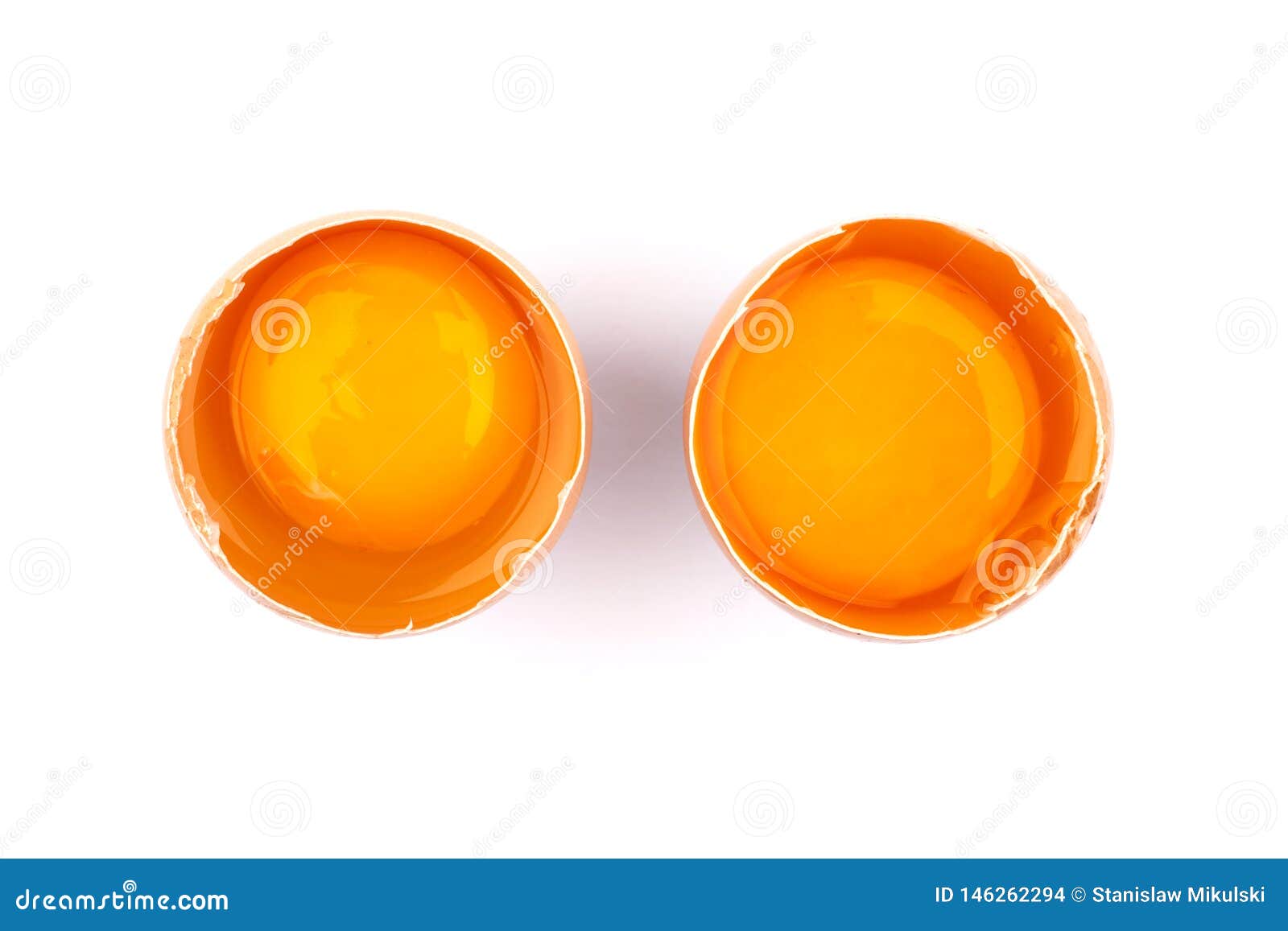 Egg in Cracked Egg Shell, Normal Egg on the Left and Bad Rotten Egg on