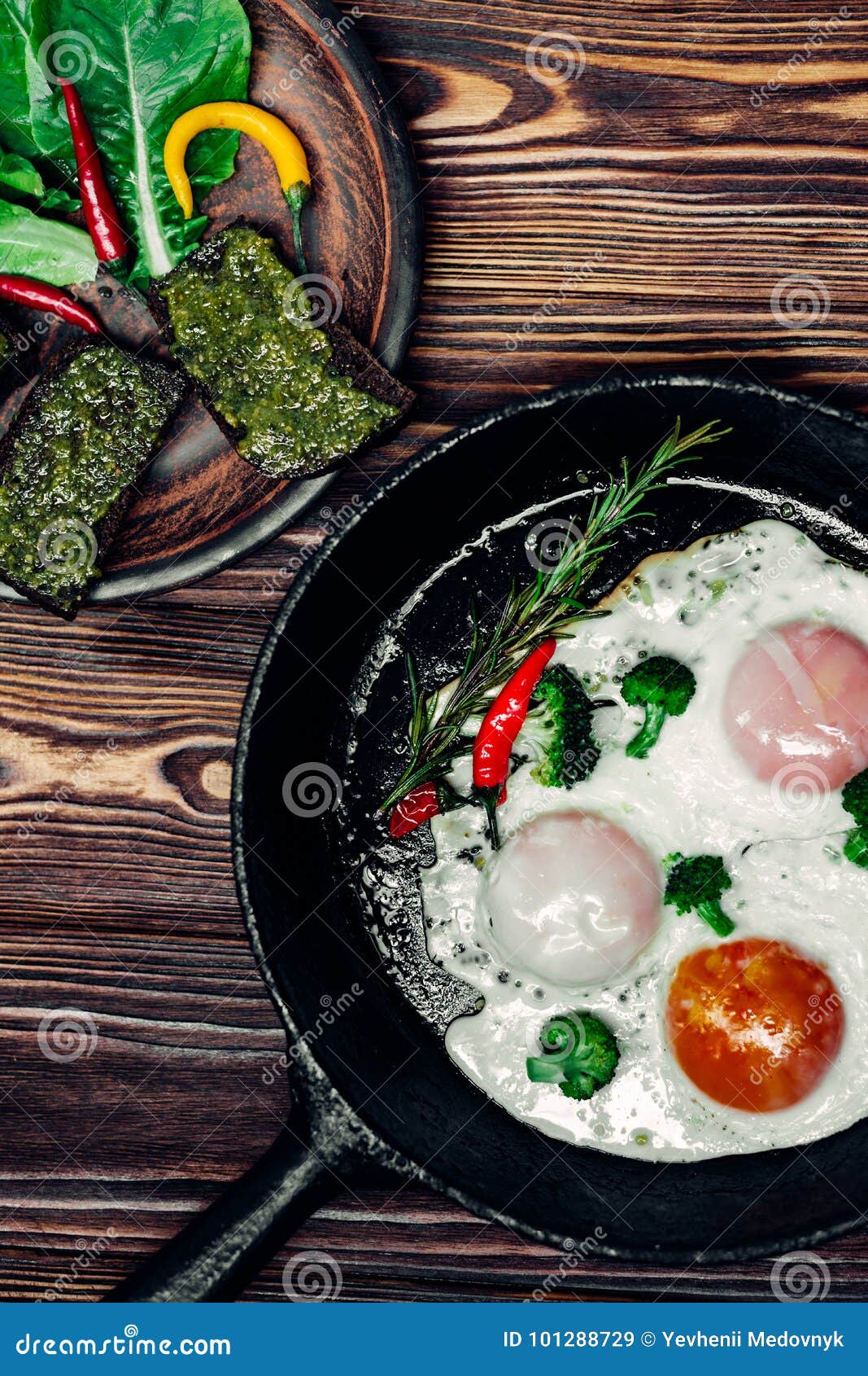 Egg in a frying pan stock image. Image of chile, sauce 101288729