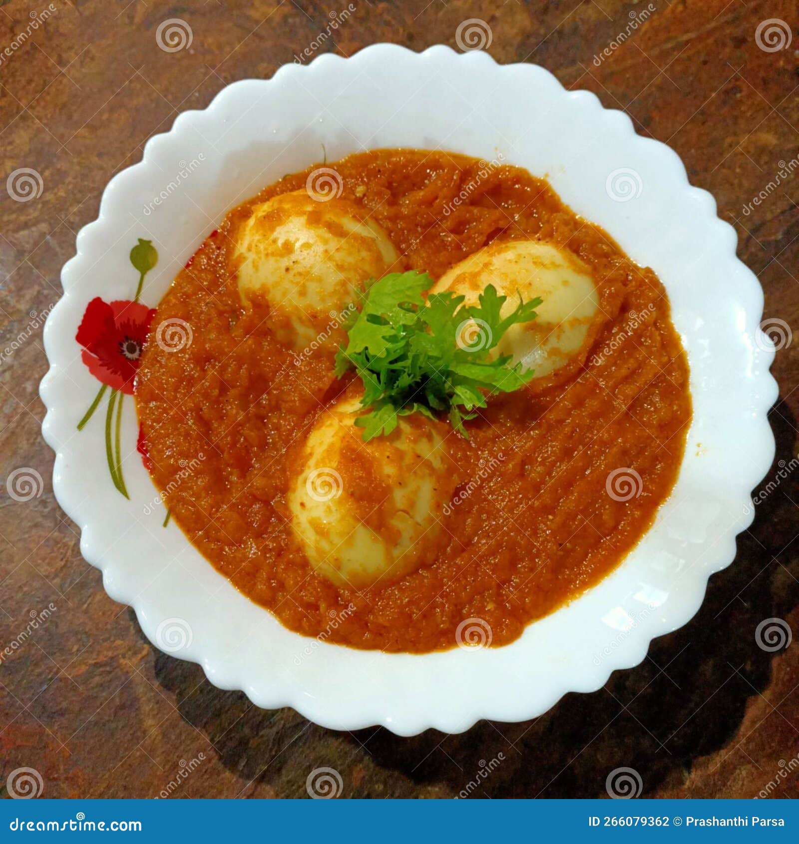 Indian Main Course Recipe of Boiled Eggs with Tomato Gravy Stock Photo