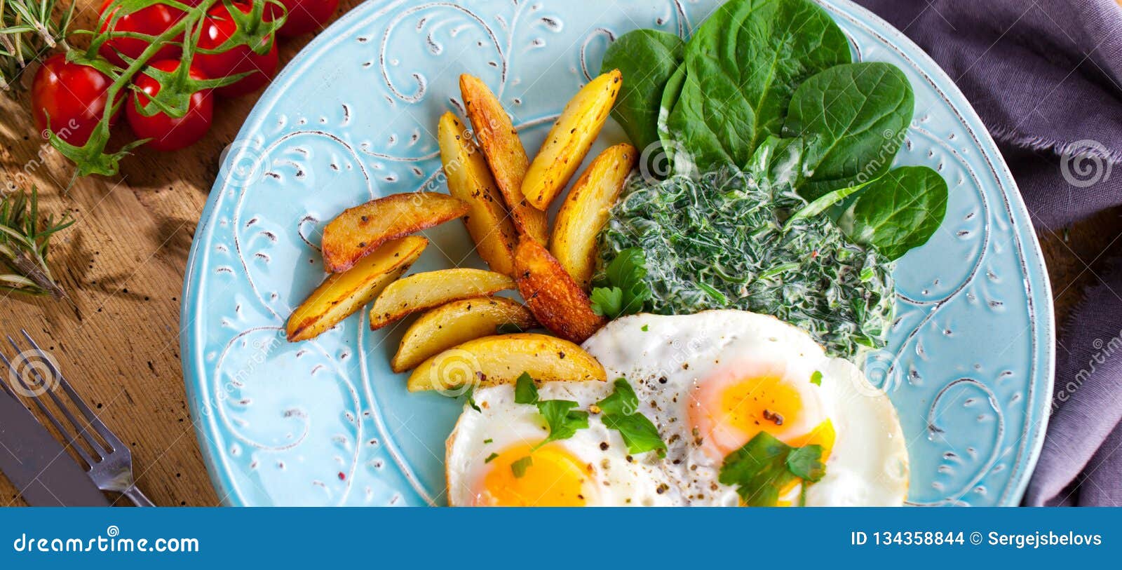 Egg Over Boiled Spinach on Blue Plate. Stock Photo Image of diet